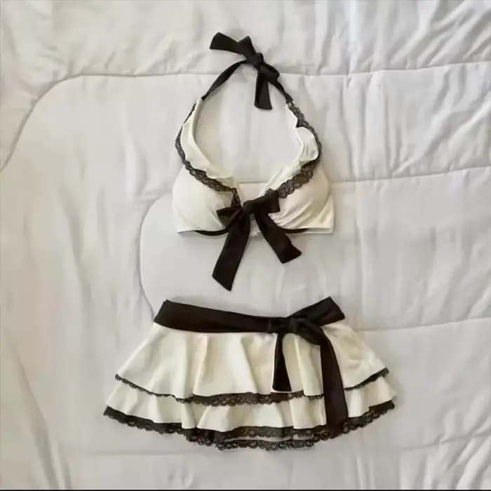 Maillot de bain deux pièces rétro élégant noir et blanc avec nœud en dentelle, haut à col en V et ba