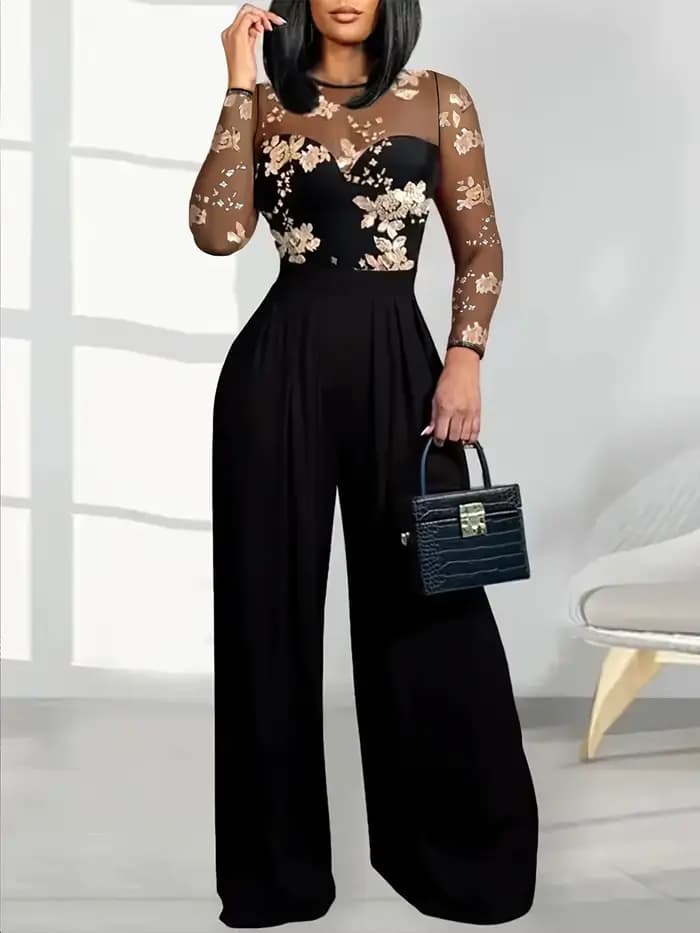 Combinaison noire pour femme avec haut brodé à fleurs transparentes, design à jambes larges, idéale pour les soirées, les cocktails, les événements formels