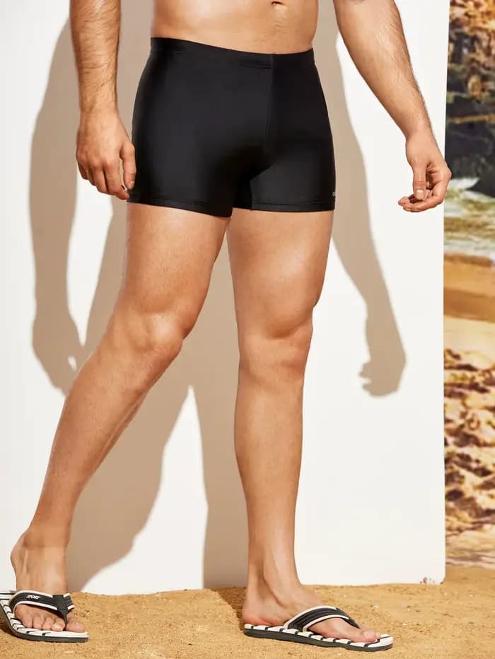 Pantalon de bain moulant à coins plats pour hommes, couleur unie, entraînement
