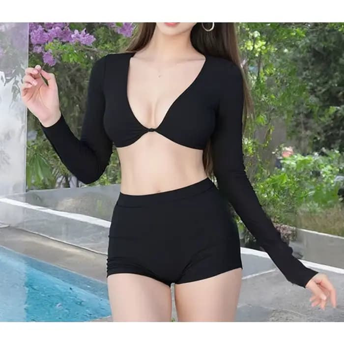 Ensemble de maillot de bain deux pièces athlétique noir avec haut court à manches longues et short taille haute