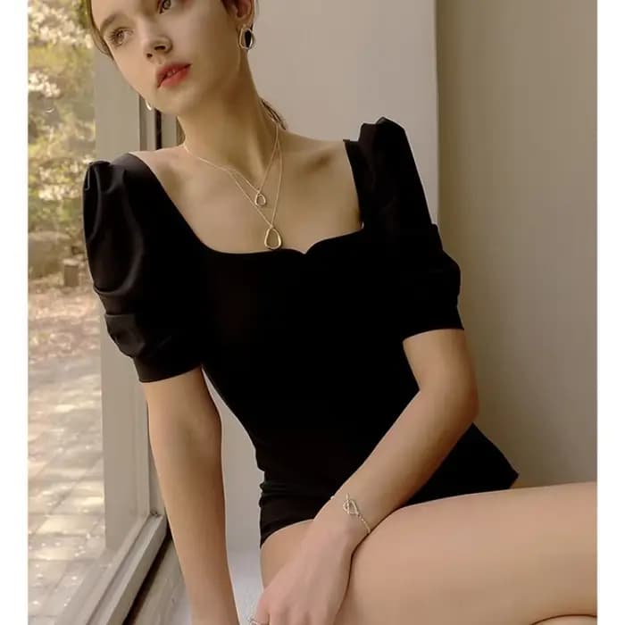 Maillot de bain une pièce noir à manches mi-longues pour femmes