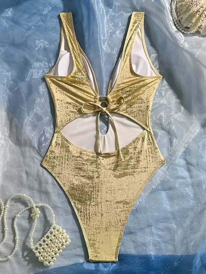 Maillot de bain une pièce doré scintillant à col en V profond pour femme, monokini dos nu à coupe haute, tenue de plage