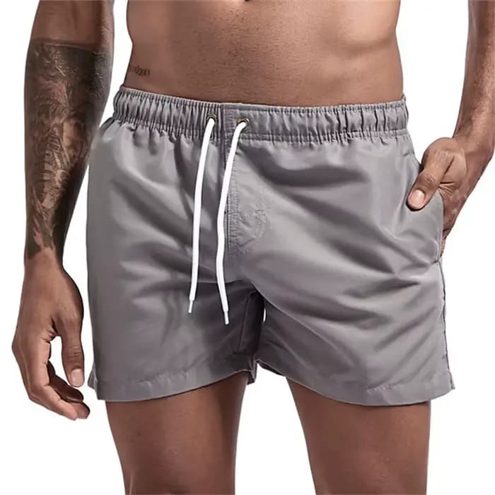 Maillot de bain pour hommes avec doublure en maille poches latérales short de plage solide séchage r